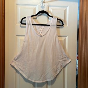 White shirt , don’t know name, size med